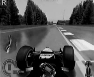 [Mustavalkoinen kuva F1-auton ohjaamosta. Artturi kovassa sivuluisussa.]